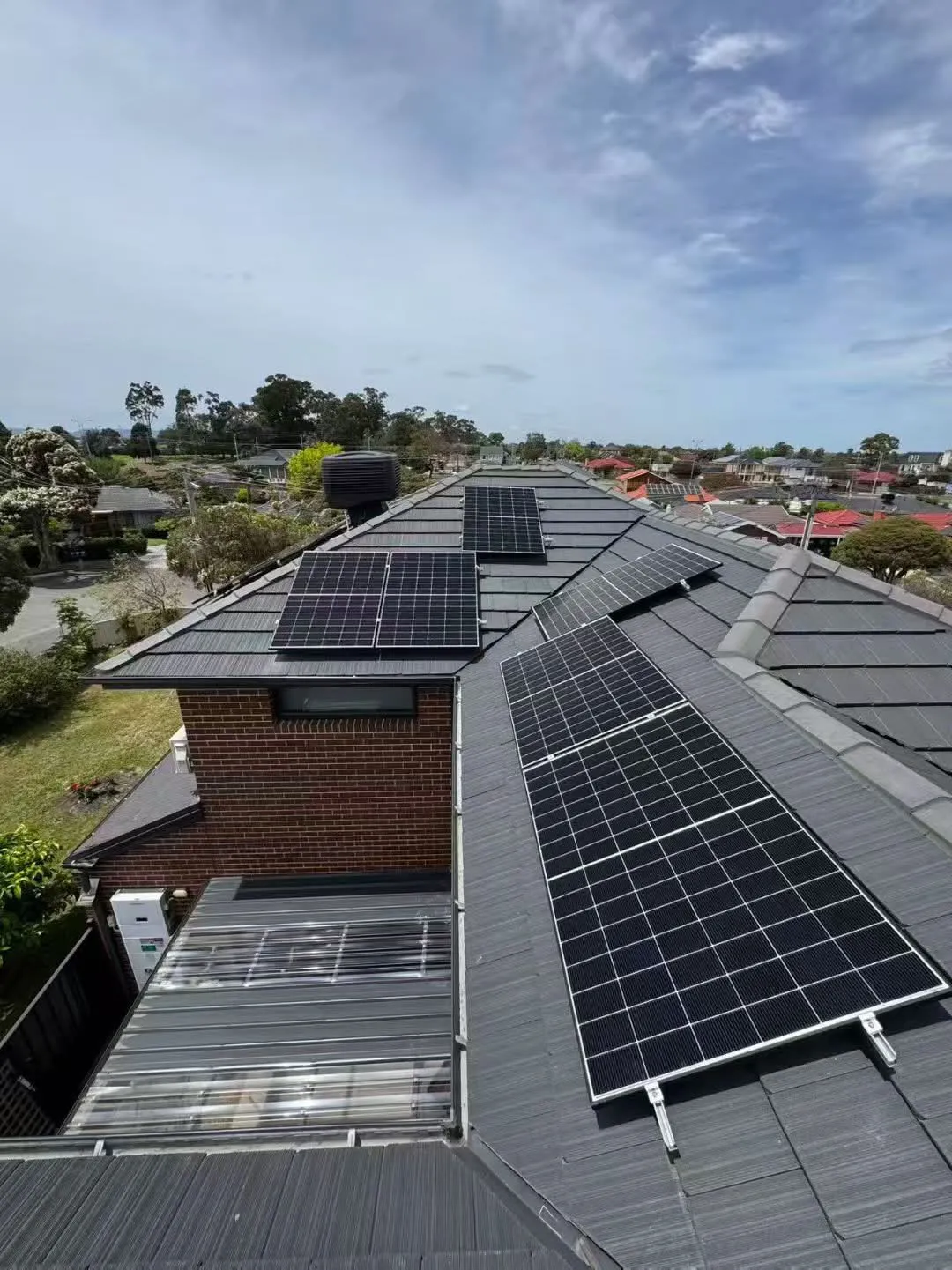 Residential 6.6 kW solar system on tiled roof